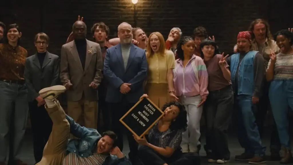 A large, diverse group of people posing for a photo at the Austin Film Festival 2026, with one person in front holding a sign that reads Brook Theater, Nosy Neighbors, Cast & Crew.